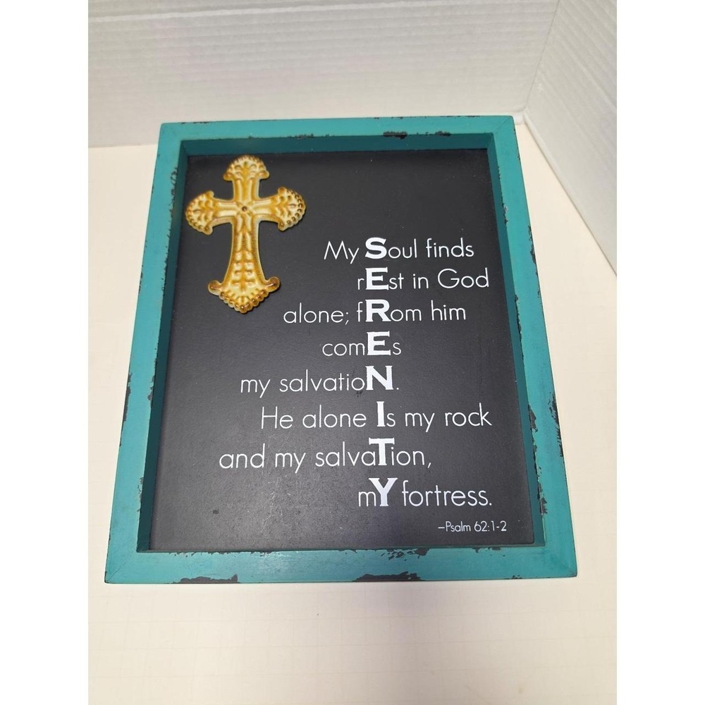 Abbey Press‎ Serenity Hanging Plaque features a rustic teal wooden frame cross